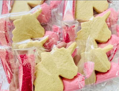 DIY party favor kits with cookies to decorate, sprinkles and icing