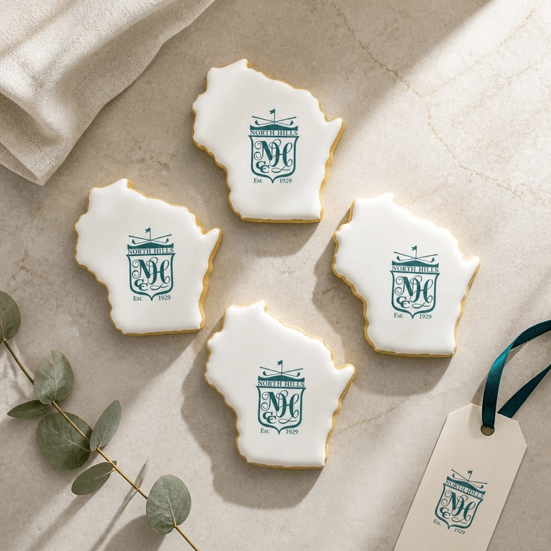 Hand-decorated celebration cookies arranged for a special event